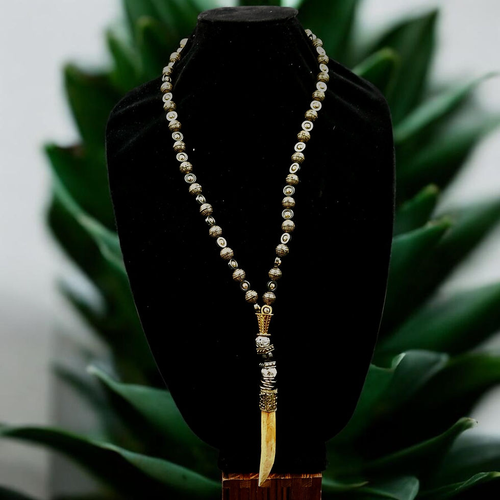 Thumbnail: Each necklace features a striking tooth, tusk, or claw pendant, symbols of courage, survival, and inner strength