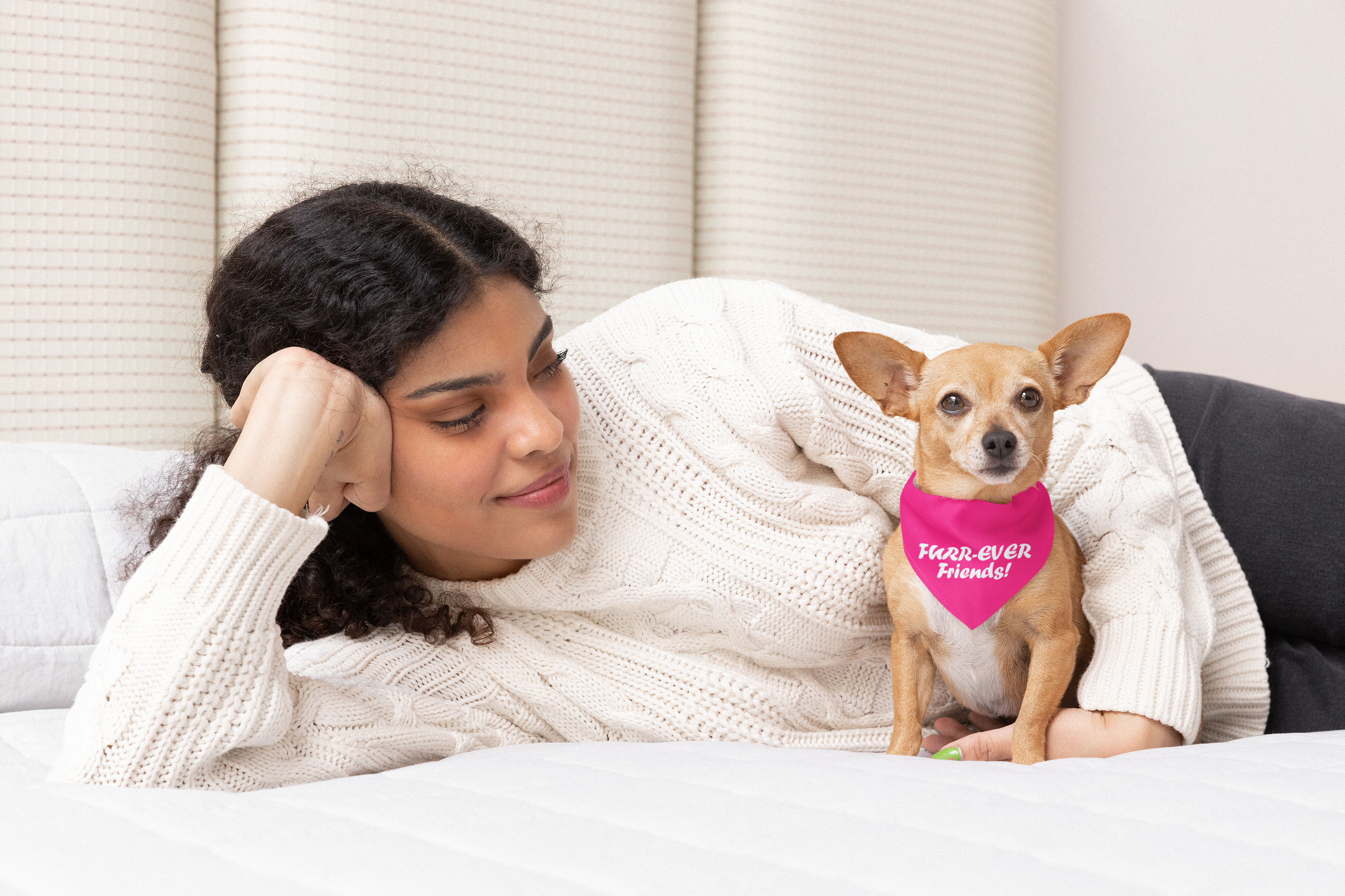Dog wearing pink bandana with furr-ever friends graphic design