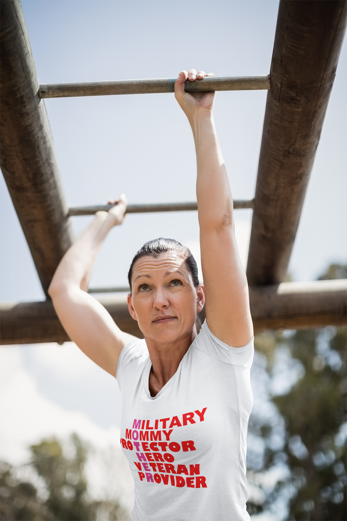 Woman wearing white shirt with mother veteran graphic design