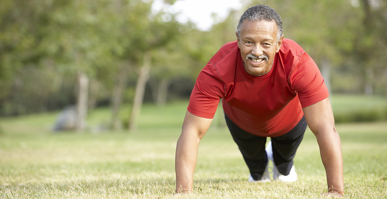 Photo of man doing push-ups