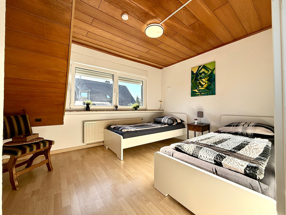 Schlafzimmer mit Einzelbetten Wohnung KL09 Wyler