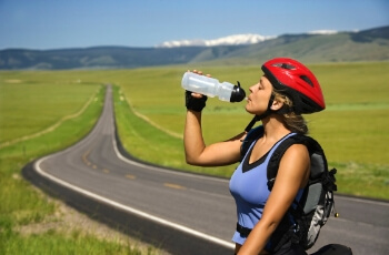Woman drinking water.