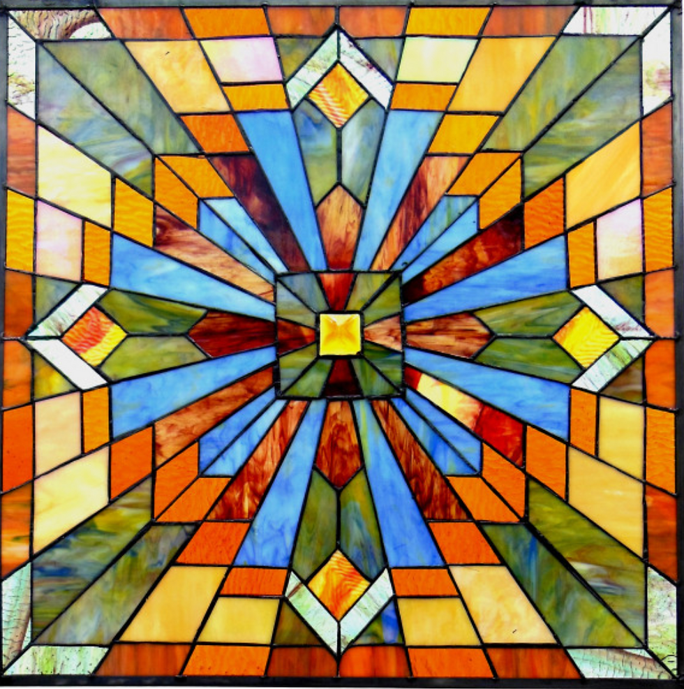 This is a simple, but stately, version of a window made of geometric shapes radiating from a small square in the center.