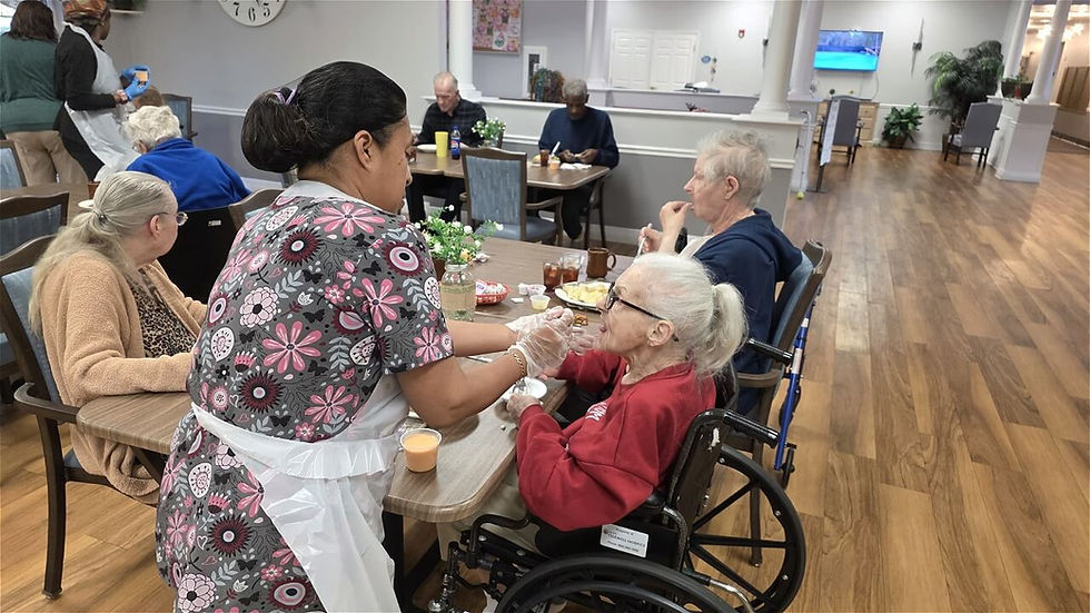 an assistance being provided to an elder lady.