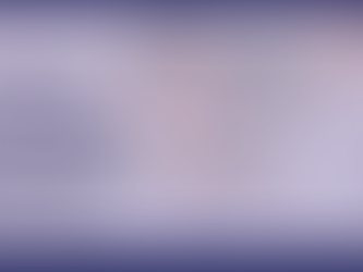 Clinician talking with smiling young male with hand on shoulder