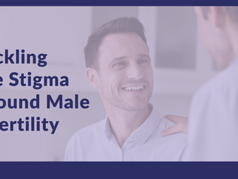 Clinician talking with smiling young male with hand on shoulder