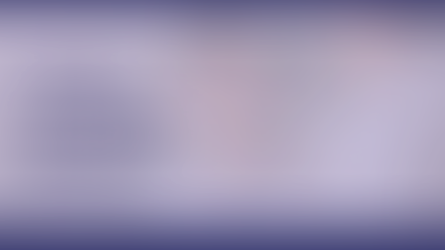 Clinician talking with smiling young male with hand on shoulder