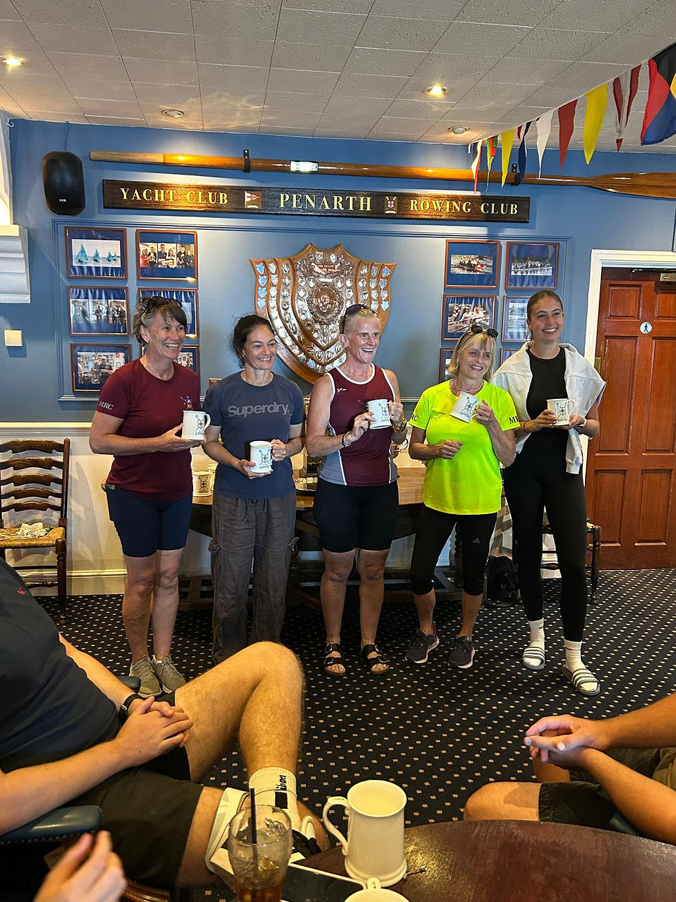 Debbie, Denize, Lou, Sue and Molly getting their pots.