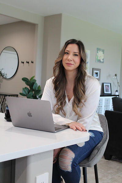 Tracy Cook at her computer doing digital marketing