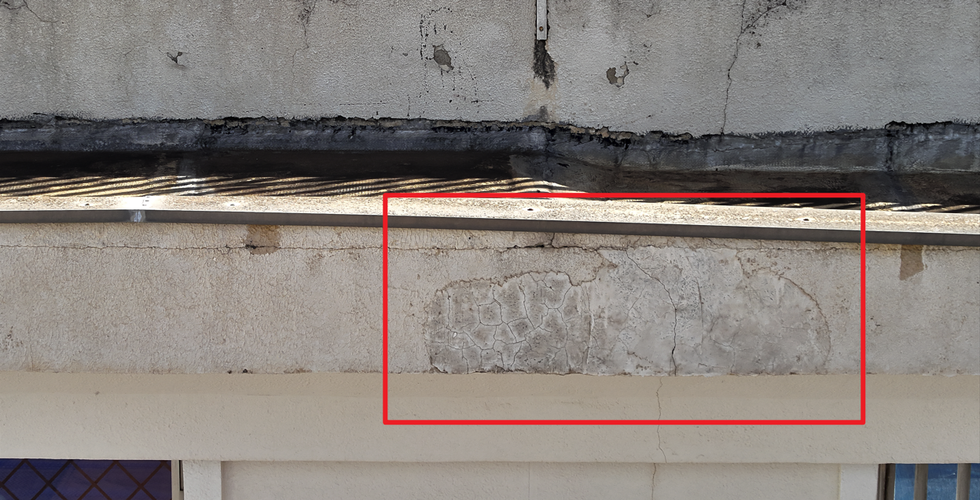 Fachada predial danificada