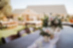 lawn with tables and cottage in background.jpg