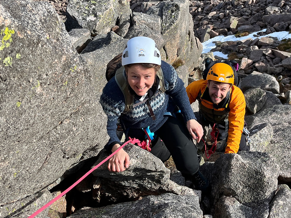 Tom and Saeqh Scrambling in the spring sunshine in the Cairngorms