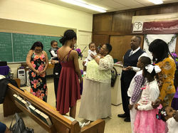 Pastor Chris Preparing to dedicate baby 
