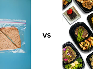 A sandwich in a clear bag on a blue background vs. various gourmet meals in black containers on white; text: "VS" in the center.