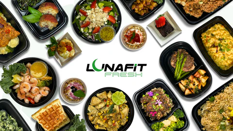 A variety of colorful meals in black containers are arranged in a circle. Center text reads LUNAFIT FRESH. Dishes include salads, waffles, and desserts.