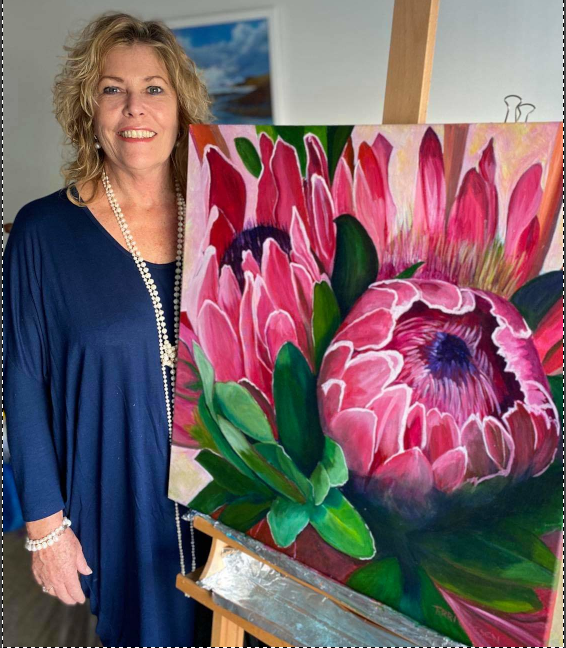 TERRI WITH PAINTING.png