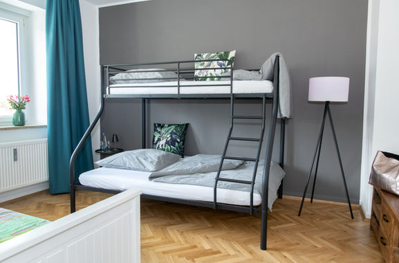Hochbett der Panorama Ferienwohnung Würzburg mit Doppelbett und ruhiger Lage am Main
