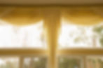 Shiny curtains on a window