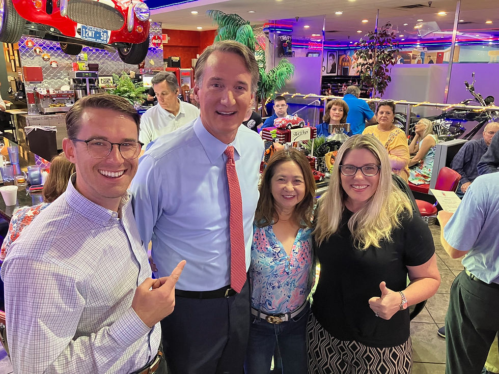 candidates pose with governor youngkin
