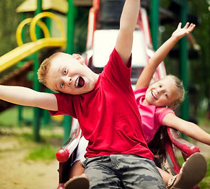 two-kids-slide-playground.jpg