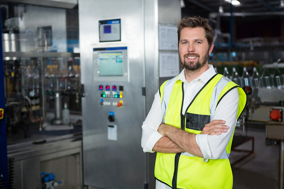 manager-standing-factory.jpg