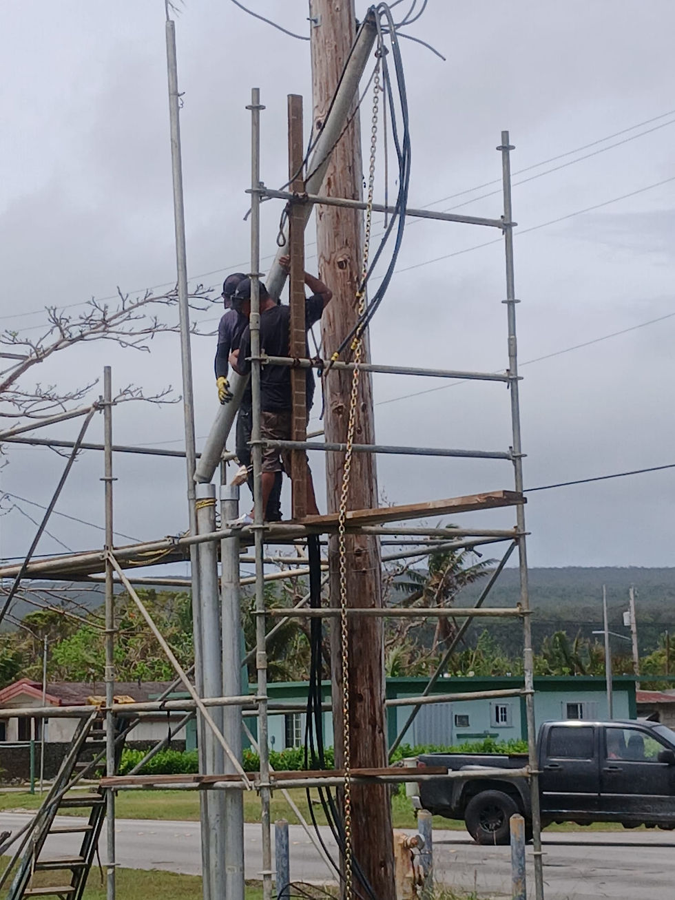 The metal weatherhead pole has been returned to an upright position following completion of drainage of the underground conduit to the Rota Centron Hustisia. Heavy rain from Super Typhoon Sinlaku flooded the conduit.
