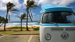 Vintage VW bus parked at Sandy Beach in Oahu