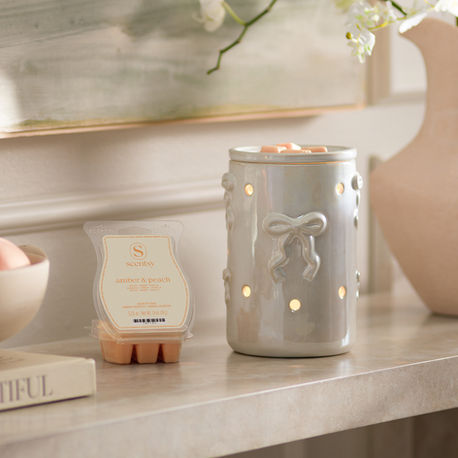 January 2026's Scentsy Warmer of the Month: Dreamer’s Bow + Amber & Peach