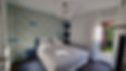 Bedroom 4 on the ground floor of A-84 vacation home with fox wallpaper and garden access