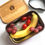 Thumbnail: Bamboo and stainless steel lunch box, showing the fruit and snacks inside