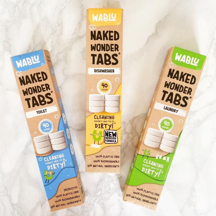 Thumbnail: Set of 3 Wablu Naked Wonder tablets for laundry, dishwasher and toilet cleaning arranged on a kitchen counter