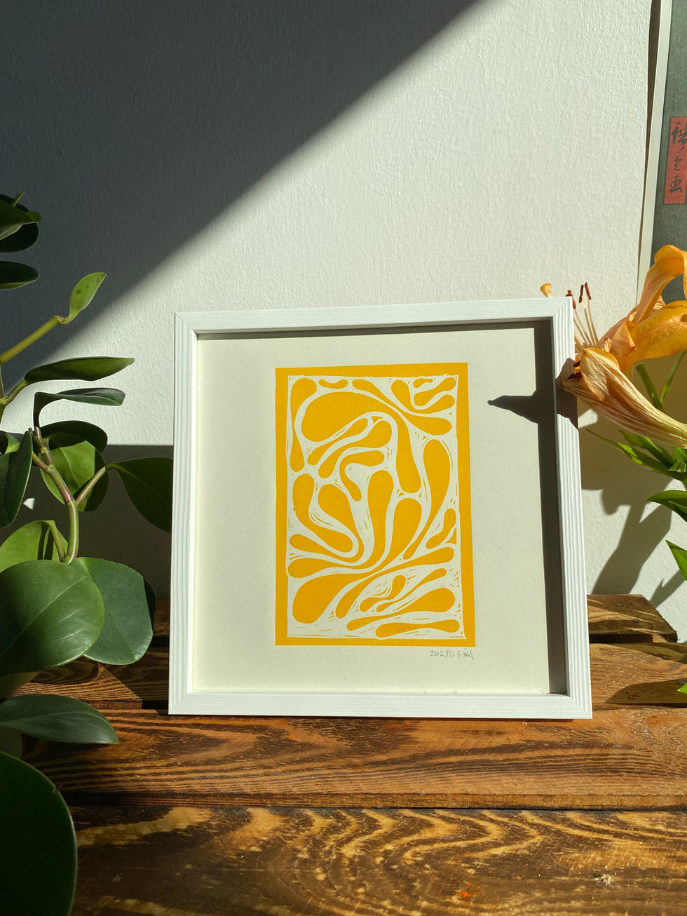 Yellow linocut prints with bobbles