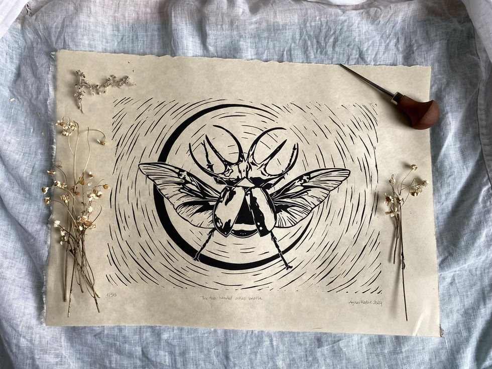 black linocut print of a two headed bug