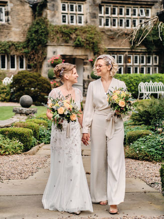 Two Brides outside Holdsworth House, Halifax