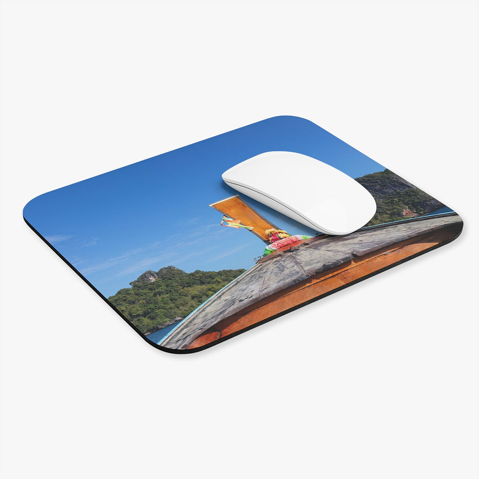 Custom photo mouse pad with longtail boat traveling in the Andaman Sea towards lush tropical islands near Krabi, Thailand.