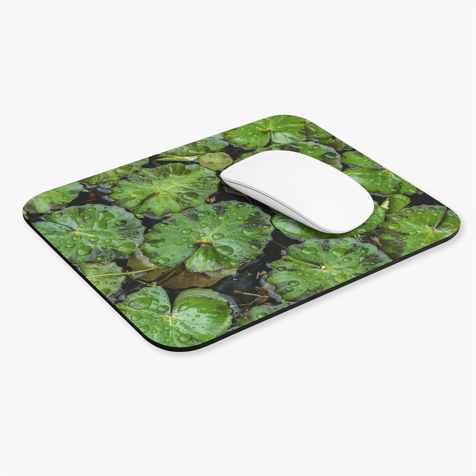 Custom photo mouse pad with lily pads on a pond.