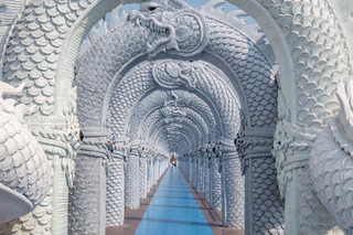 Arched serpent pathway temple wat don yai thailand