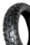 Rear view of Motoz Tractionator GPS Tire displaying deep tread grooves and DOT certification mark.