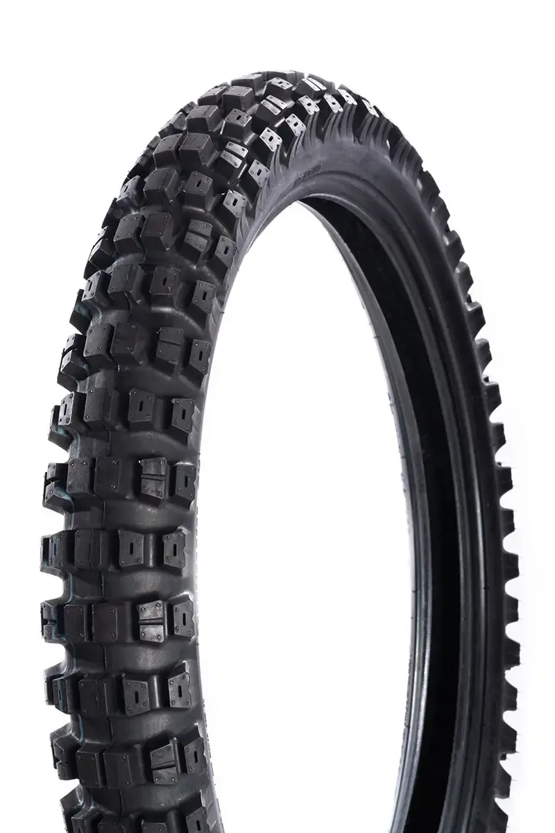 Side view of Motoz Tractionator Dual Venture Tire showing directional tread pattern and aggressive shoulder lugs.