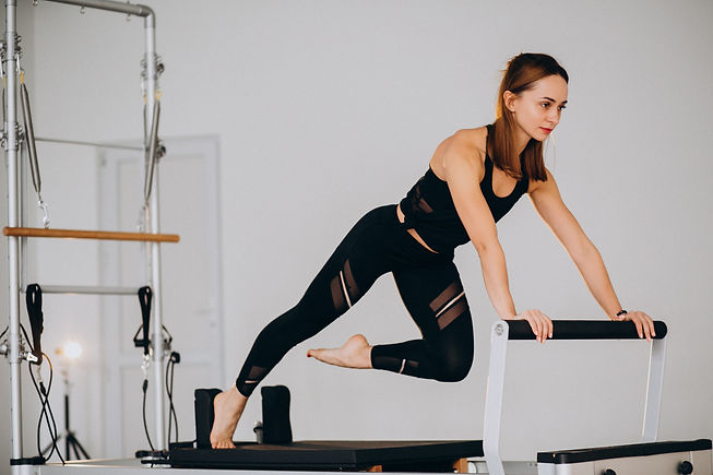 woman-doing-pilates-reformer.jpg