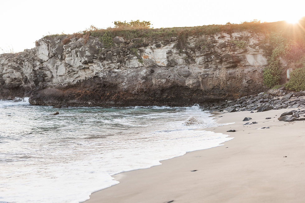 Eye-level view of a rocky landscape with a waterfall