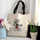 Thumbnail: Canvas tote bag with black handle