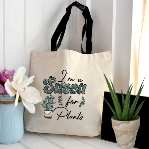 Thumbnail: Canvas tote bag with black handles