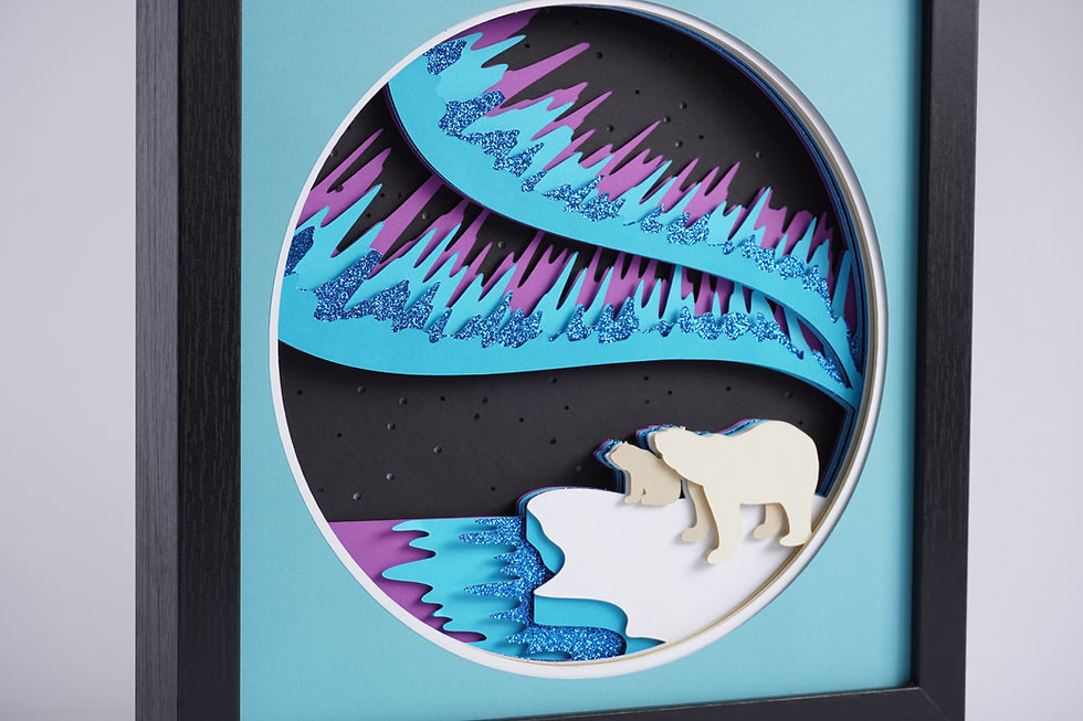 Thumbnail: Black framed 3D shadow box of the northern lights with two polar bears on ice and turquoise, blue and purple