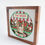 Thumbnail: Brown framed 3d shadow box of a Christmas toy store