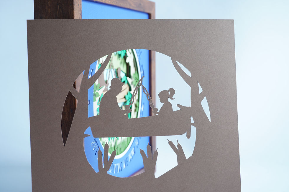 Thumbnail: Brown framed 3D shadow box of a girl and her father fishing on a lake