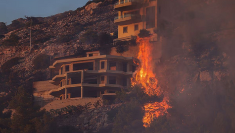 Wildfires Burn Homes Near Greek Capital, Residents Flee