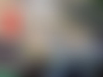 Street scene in Peshawar, Pakistan – green rickshaws lined up beneath a tangle of wires, capturing the vibrant stillness of everyday life in South Asia.