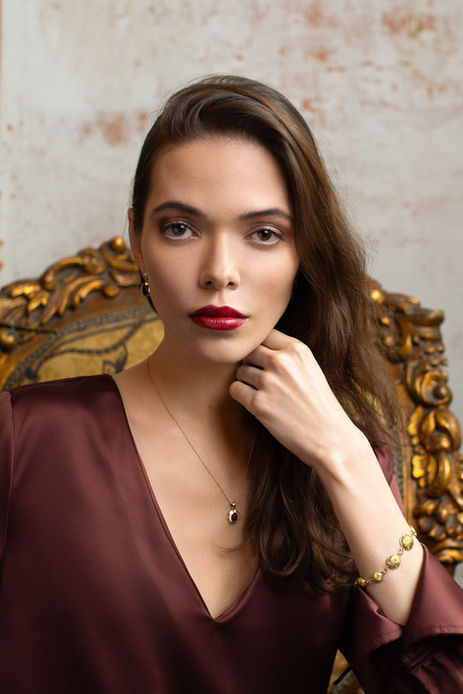 Rose gold, red enamel and diamond Ellipse pendant and 18ct gold Constellation bracelet