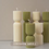 Thumbnail: Handmade Scented Decorative Candles with Striped Columns and Blue Wind Chimes